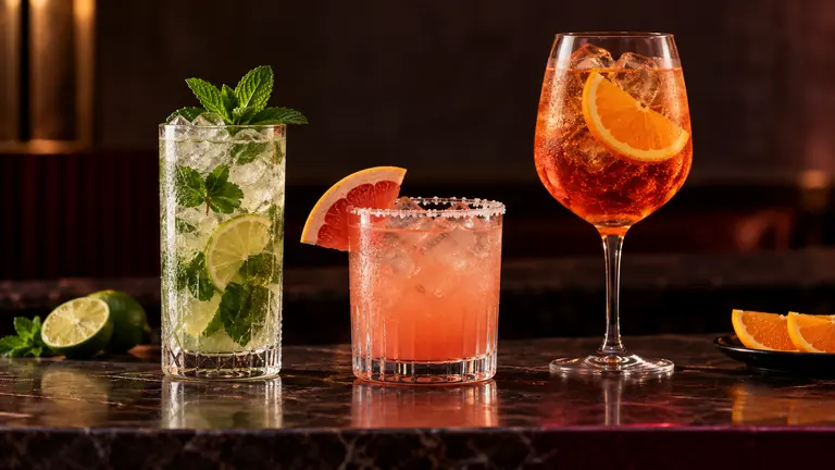 Mojito, Paloma y Aperol Spritz con cítricos frescos